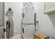 Functional laundry area featuring stacked washer and dryer at 18902 Spring Hollow Dr, Lutz, FL 33559