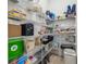 Organized walk-in pantry with wire shelving offering ample storage space at 18902 Spring Hollow Dr, Lutz, FL 33559