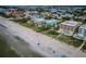 Gorgeous beachside properties boast private pools and balconies overlooking the Gulf of Mexico in this areal coastal view at 1912 Gulf Blvd # 305, Indian Rocks Beach, FL 33785