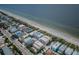 Aerial view of condo complex featuring Gulf Coast views and parking at 1912 Gulf Blvd # 305, Indian Rocks Beach, FL 33785