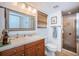 Cozy bathroom with updated vanity, countertop and walk-in shower at 1912 Gulf Blvd # 305, Indian Rocks Beach, FL 33785