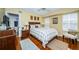 Comfortable bedroom with hardwood floors, natural light, and a cozy ambiance at 1912 Gulf Blvd # 305, Indian Rocks Beach, FL 33785