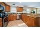Functional kitchen with granite countertops, modern appliances, and plenty of cabinet space for organization at 1912 Gulf Blvd # 305, Indian Rocks Beach, FL 33785