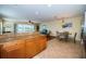 Open-concept kitchen featuring granite countertops and stainless steel appliances, perfect for entertaining at 1912 Gulf Blvd # 305, Indian Rocks Beach, FL 33785