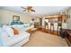 Open-concept living room flows into dining area and kitchen, promoting a sense of spaciousness at 1912 Gulf Blvd # 305, Indian Rocks Beach, FL 33785