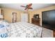 Main bedroom suite featuring hardwood floors, ensuite bathroom, and ample closet space at 1912 Gulf Blvd # 305, Indian Rocks Beach, FL 33785