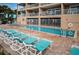 A beautiful pool and lounging area is conveniently located near the condos at 1912 Gulf Blvd # 305, Indian Rocks Beach, FL 33785