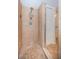 Tiled walk-in shower featuring updated fixtures and tile flooring at 1912 Gulf Blvd # 305, Indian Rocks Beach, FL 33785