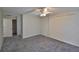 Spacious bedroom with carpet, an ensuite bathroom, and a closet at 1915 W Del Webb Blvd, Sun City Center, FL 33573