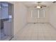 Open dining area with tile floors and a bright window at 1915 W Del Webb Blvd, Sun City Center, FL 33573