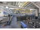 A fully equipped gym with treadmills, weight machines, and free weights offers a modern workout space at 1915 W Del Webb Blvd, Sun City Center, FL 33573