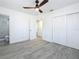 Well-lit bedroom includes a spacious closet and a renovated bathroom at 200 Lewis Se Blvd, St Petersburg, FL 33705