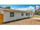 Charming single-story home featuring a well-maintained exterior and beautiful landscaping at 200 Lewis Se Blvd, St Petersburg, FL 33705