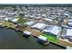 Aerial view of the waterfront community with docks and boatlifts at 210 N Saint Thomas Cir, Apollo Beach, FL 33572