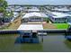 Waterfront home featuring a private dock, perfect for boating and enjoying scenic water views at 210 N Saint Thomas Cir, Apollo Beach, FL 33572
