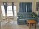 Inviting living area featuring soft lighting, comfortable seating, and stylish decor at 21034 Lirio Dr, Land O Lakes, FL 34637