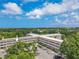 An aerial view of the property shows the beautiful exterior and landscaping at 2436 Rhodesian Dr # 24, Clearwater, FL 33763