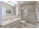 Clean bathroom featuring a shower, sink and vanity with a bright vanity light at 2436 Rhodesian Dr # 24, Clearwater, FL 33763