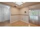 An open living area features hardwood floors, neutral walls, and recessed lighting, creating a stylish and inviting ambiance at 2436 Rhodesian Dr # 24, Clearwater, FL 33763
