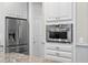 Gourmet kitchen features stainless appliances and sleek white cabinetry at 2714 W Jetton Ave, Tampa, FL 33629