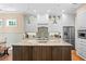 Spacious kitchen with granite counters, stainless steel appliances and custom cabinets at 2714 W Jetton Ave, Tampa, FL 33629