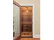 Climate-controlled wine cellar with custom wood racking and storage solutions at 2714 W Jetton Ave, Tampa, FL 33629