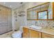 Bathroom features tiled walls, glass shower, and vanity with a modern sink at 2788 70Th S Ave, St Petersburg, FL 33712