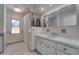 Well-lit bathroom with white tile, shower stall, and updated fixtures and finishes at 2788 70Th S Ave, St Petersburg, FL 33712