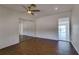Airy bedroom with ceiling fan, mirrored closet, and a view of the water at 2788 70Th S Ave, St Petersburg, FL 33712