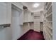 Walk-in closet with custom shelving and ample storage space at 2788 70Th S Ave, St Petersburg, FL 33712
