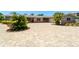 Well-manicured landscaping and a circular brick paver driveway at 2788 70Th S Ave, St Petersburg, FL 33712