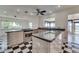 Well-appointed kitchen showcasing stainless steel appliances, sleek countertops, and views of the water at 2788 70Th S Ave, St Petersburg, FL 33712
