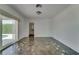 This living room features a marble floor and a sliding glass door to the pool at 2788 70Th S Ave, St Petersburg, FL 33712