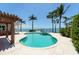 Inviting backyard pool with an attached spa and unobstructed views of the beautiful waterfront at 2788 70Th S Ave, St Petersburg, FL 33712