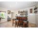 Elegant bar area with stools, decorative lighting, and open space for entertaining at 2834 Pelham N Rd, St Petersburg, FL 33710