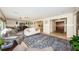 Spacious open-concept living room with tile floors and waterfront views at 2834 Pelham N Rd, St Petersburg, FL 33710