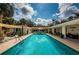 Spacious backyard featuring a large swimming pool, perfect for outdoor relaxation and entertainment at 2834 Pelham N Rd, St Petersburg, FL 33710