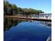 Enjoy the serene waterfront from this community dock; perfect for boating, fishing, and relaxing at 3137 Mission Grove Dr # 3137, Palm Harbor, FL 34684