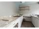Gourmet kitchen featuring stone countertops, gas range, and stainless-steel appliances at 3342 Waterford Dr, Clearwater, FL 33761