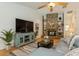 Living room features hardwood floors, decorative fireplace and built-in shelving at 3342 Waterford Dr, Clearwater, FL 33761