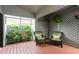 Tranquil outdoor patio with comfortable seating and lush plant decor at 3342 Waterford Dr, Clearwater, FL 33761