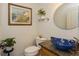 Charming powder room with vessel sink, decorative mirror, and stylish accents at 3342 Waterford Dr, Clearwater, FL 33761