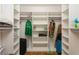 Organized walk-in closet with adjustable shelving, providing ample storage space at 3342 Waterford Dr, Clearwater, FL 33761