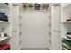 Organized walk-in closet with ample shelving and storage for clothing and accessories; empty and ready to be stocked at 3342 Waterford Dr, Clearwater, FL 33761