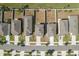 An aerial view showcases the neighborhood's well-maintained homes and inviting street layout in a peaceful community setting at 34847 Daisy Meadow Loop, Zephyrhills, FL 33541