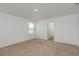Spacious bedroom with carpet flooring and a window at 34847 Daisy Meadow Loop, Zephyrhills, FL 33541