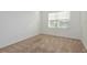 Cozy bedroom with plush carpet, bright natural light, and crisp white walls at 34847 Daisy Meadow Loop, Zephyrhills, FL 33541