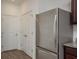 Kitchen featuring a stainless steel refrigerator and a pantry at 34847 Daisy Meadow Loop, Zephyrhills, FL 33541