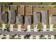 Aerial view of home rooftops, driveways, and tree-lined streets within the neighborhood at 34855 Daisy Meadow Loop, Zephyrhills, FL 33541