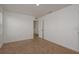Bright bedroom with carpet flooring and neutral walls at 34866 Daisy Meadow Loop, Zephyrhills, FL 33541